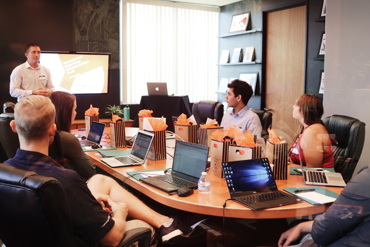 Business team reviewing payroll and superannuation figures together.